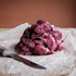Raw steak & kidney on a wooden surface with a knife