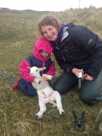 Fiona and Aila marking the lamb